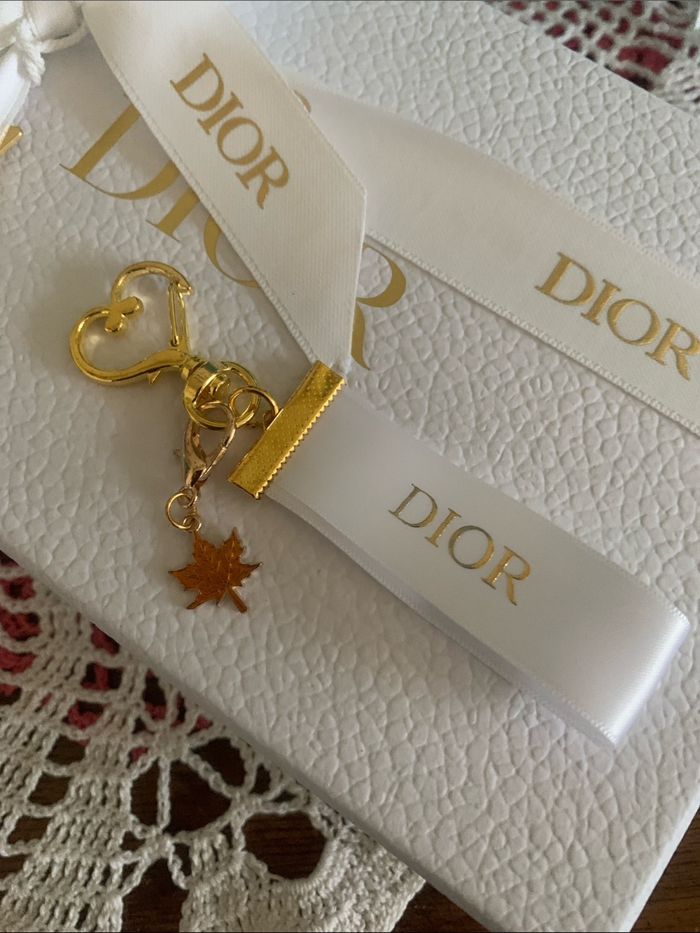 Dior White Ribbon Key & Maple Charm with Gold Hardware
